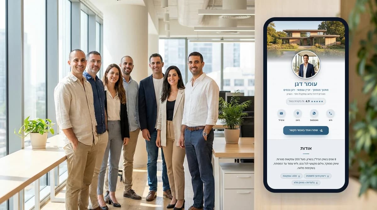 A team of colleagues standing together in a bright open-plan office, with a digital business card open on a phone beside them